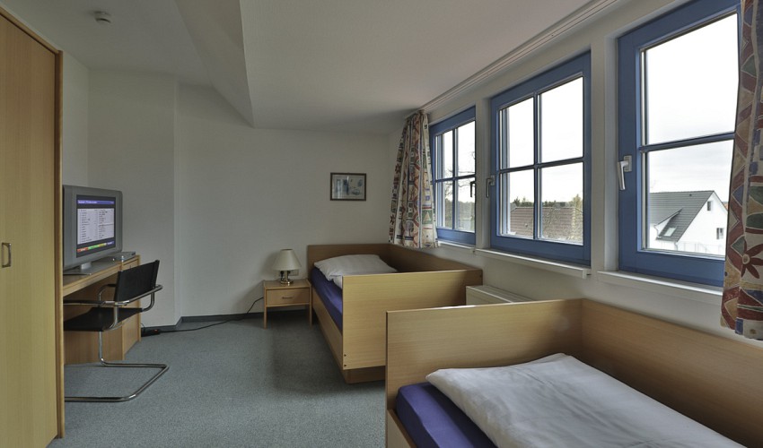 Schlafzimmer mit Einzelbetten