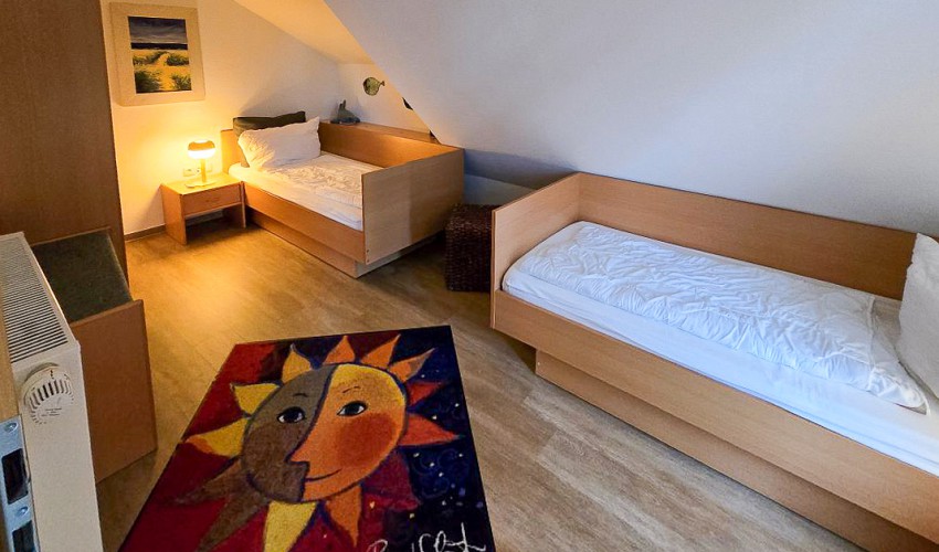 Schlafzimmer mit Einzelbetten