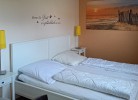 Schlafzimmer mit Doppelbett