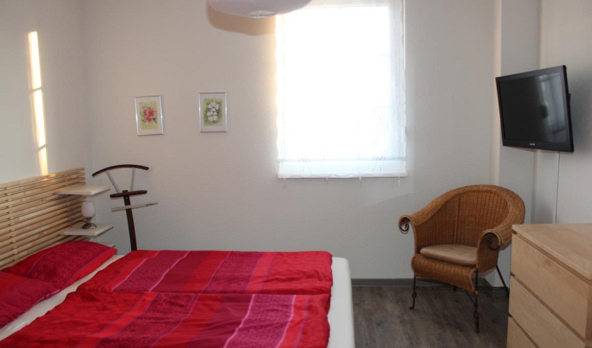 Schlafzimmer mit Doppelbett