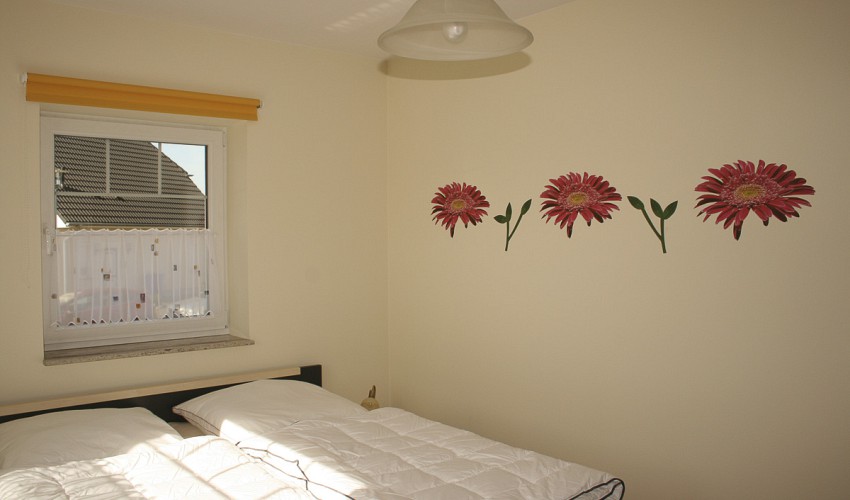 Schlafzimmer mit Doppelbett